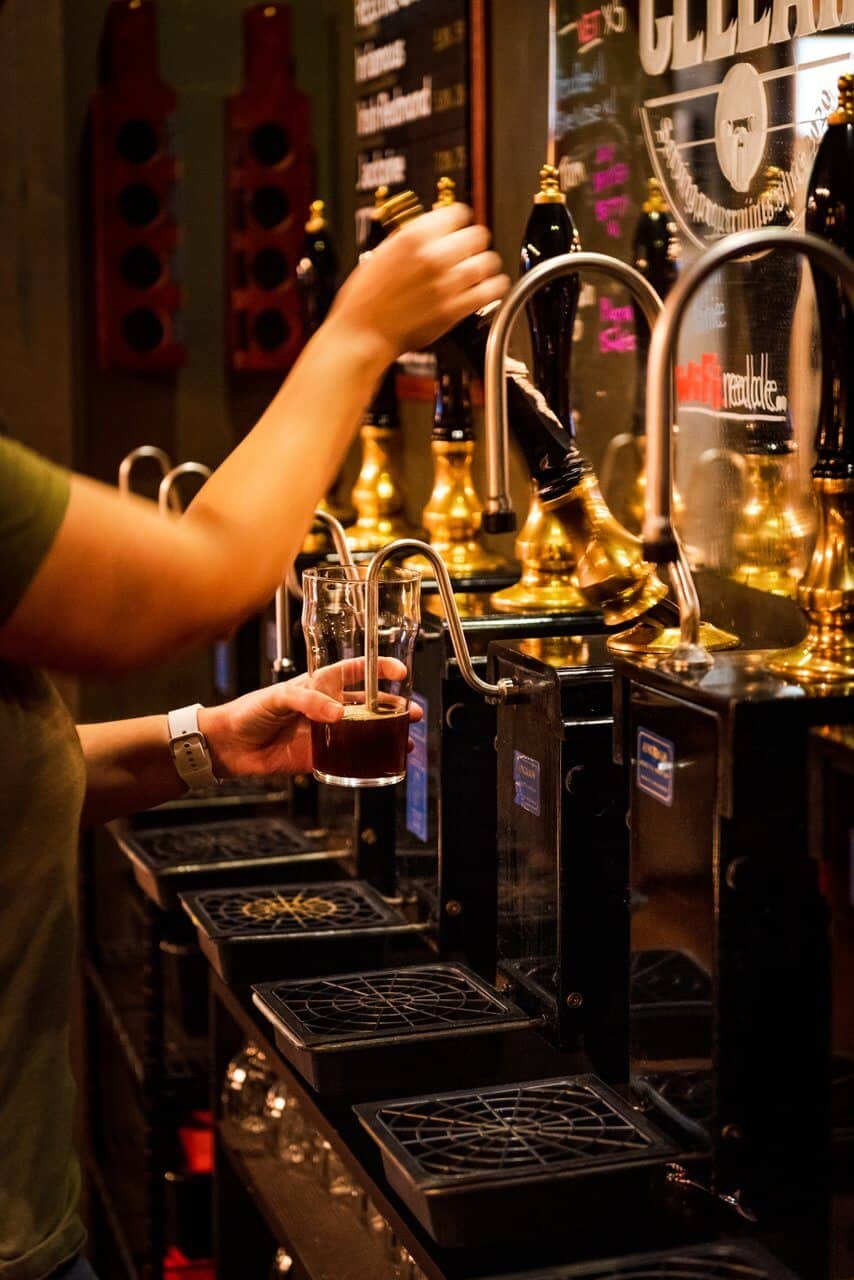 A drink is poured at The Cellar in Redmond. 