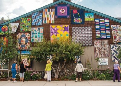 quilts hung outside during the annual Sisters Quilt Show