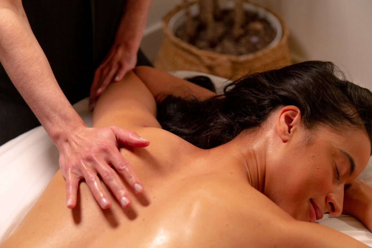 Woman getting a back massage. Woman getting a back massage.